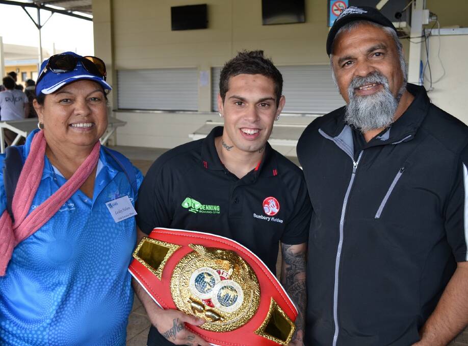 Champ: Boxing champion Nathaniel “Cheeky” May with SWAMS CEO Lesley Nelson and Board Chairperson Karim Khan.