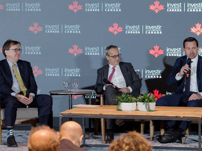 Jonathan Wilkinson (left), Rio's Jerome Pecresse (c) and BHP's Rag Udd at the Toronto convention. (HANDOUT/BHP)