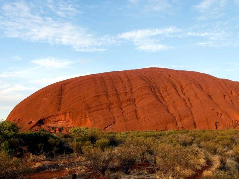 Virgin is increasing flights to Uluru from Brisbane and Melbourne for people drawn to the icon. (Terry Trewin/AAP PHOTOS)