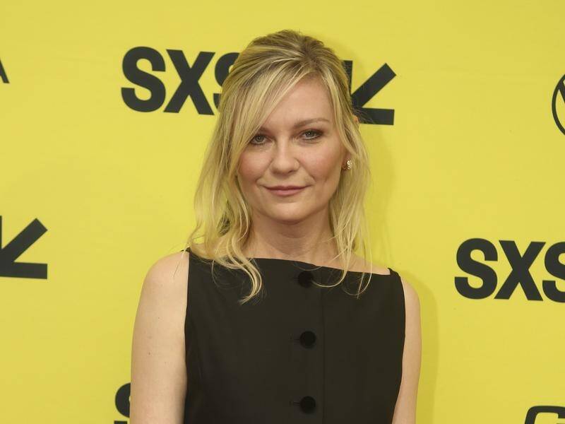Kirsten Dunst arrives for the world premiere of Civil War at the Paramount Theatre in Austin, Texas. (AP PHOTO)